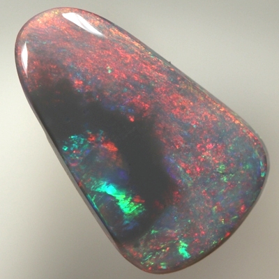 SOLID BLACK OPAL Bright red with green surrounded by black opal